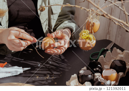 Tutorial How to make Easter table decoration with egg shells step by step instruction. Easter home decoration on wooden branch. Seasonal sustainable recycled Tutorial How to make Easter table decoration with egg shells step by step instruction. Easter home decoration on wooden branch. Seasonal sustainable recycled 121392011