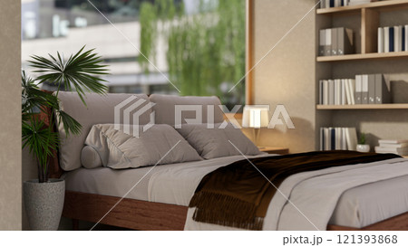 The interior design of a modern, elegant bedroom features a comfortable bed and sleek decor. The interior design of a modern, elegant bedroom features a comfortable bed and sleek decor. 121393868