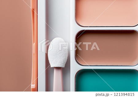 Colorful concealers palette with mocha mousse color close-up Colorful concealers palette with mocha mousse color close-up 121394815
