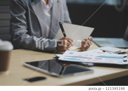 Business Documents, Auditor businesswoman checking searching document legal prepare paperwork or report for analysis TAX time,accountant Documents data contract partner deal in workplace office 121395198
