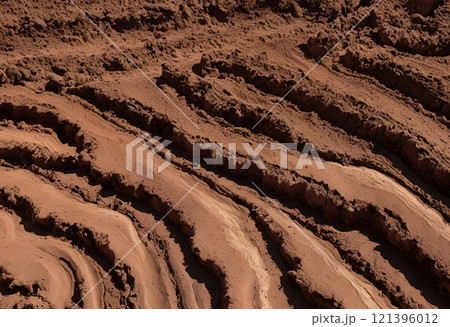 Soil cracks creating visible lines or fissures on the surface.AI Generated 121396012