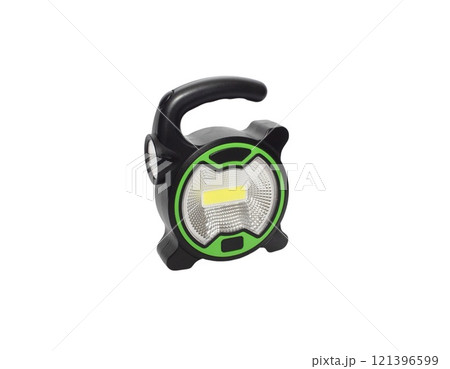 Black flashlight isolated on white background. Black Battery-powered flashlight top view 121396599