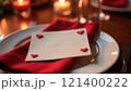 Romantic table setting with hearts and candles for Valentine's Day. 121400222
