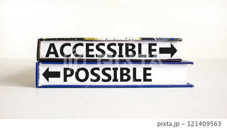 Accessible or possible symbol. Concept word Accessible or Possible on beautiful books. Beautiful white table white background. Business and accessible or possible concept. Copy space 121409563