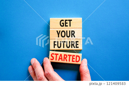 Get your future started symbol. Concept words Get your future started on beautiful wooden blocks. Businessman hand. Beautiful blue background. Business get your future started concept. Copy space. 121409583