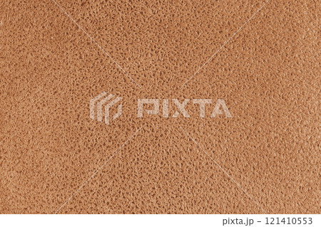 Orange suede leather texture with embossed spotted pattern background, fleecy fabric texutre 121410553