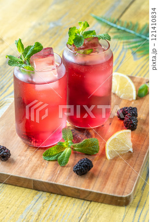 Blackberry Fizz Mocktail with mint, lime, and honey for a refreshing sip Blackberry Fizz Mocktail with mint, lime, and honey for a refreshing sip 121410834