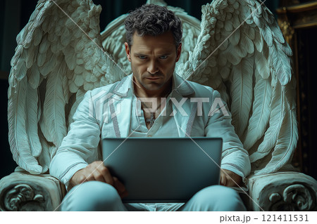 Angel sits at a desk with a modern laptop, surrounded by greenery and natural light. Angel sits at a desk with a modern laptop, surrounded by greenery and natural light. 121411531