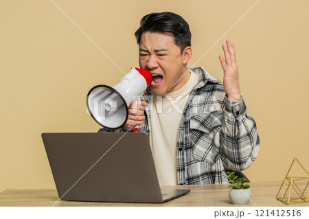 Man arguing talking on laptop conversation by webcam, quarrels, expresses a problem with employees Man arguing talking on laptop conversation by webcam, quarrels, expresses a problem with employees 121412516
