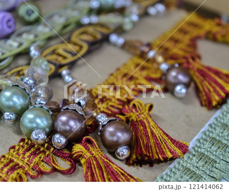 beautiful ruffles ribbons and beads for sewing and needlework. High quality photo 121414062