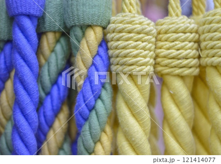 decorative brush pendants for the canopy. colored tassels made of thread for hanging on curtains. items for needlework sewing and embroidery for home comfort and window decoration. High quality photo 121414077