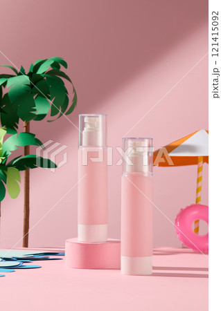 Mockup of sunscreen product shows two pink pump bottles, one on a pink cylindrical platform, set against a pink background, with a summer beach theme featuring some miniature paper cut-outs. 121415092