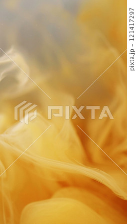 Shimmer liquid. Dust magic. Defocused bright yellow cloud paint ink mist vortex vapor steam moving on abstract art background. Shimmer liquid. Dust magic. Defocused bright yellow cloud paint ink mist vortex vapor steam moving on abstract art background. 121417297