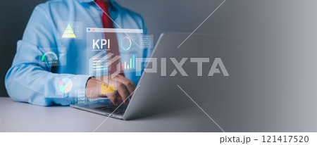 Business people use computers to analyze business and manage corporate data in office, Business analytics with charts, KPIs to improve organizational performance, Financial and marketing strategy. Business people use computers to analyze business and manage corporate data in office, Business analytics with charts, KPIs to improve organizational performance, Financial and marketing strategy. 121417520