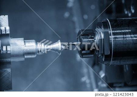 The CNC lathe machine milling the metal shaft parts by milling spindle. The CNC lathe machine milling the metal shaft parts by milling spindle. 121423043