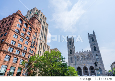 Place d'Armes in Old Montreal. Notre-Dame Basilica, Aldred Building, New York Life Insurance Building. Montreal, Quebec, Canada. 121423426