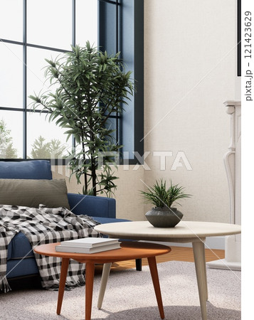 A cozy living room with a blue sofa, a stylish coffee table, a plant, and large windows letting in natural light. 3D rendering 121423629