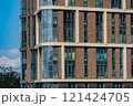 Facade of a modern residential building, building texture 121424705