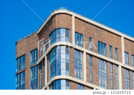 Facade of a modern residential building, building texture Facade of a modern residential building, building texture 121424713