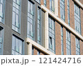 Facade of a modern residential building, building texture 121424716
