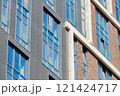 Facade of a modern residential building, building texture 121424717