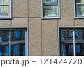 Facade of a modern residential building, building texture 121424720