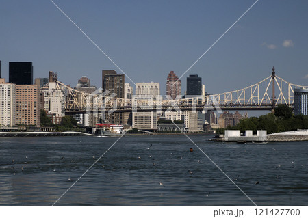 Queensboro Bridge in New York City, spanning the East River. new york manhattan view from east river 121427700