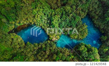 Most transparent lake with crystal blue water in Sulawesi. Drone view Most transparent lake with crystal blue water in Sulawesi. Drone view 121429348
