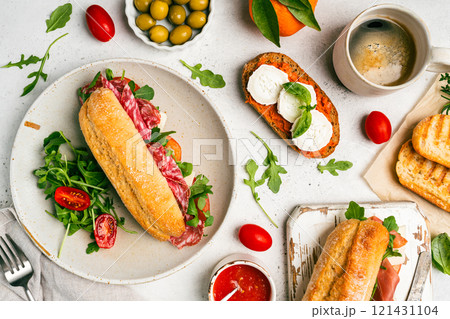 Assorted delicious baguette sandwiches 121431104