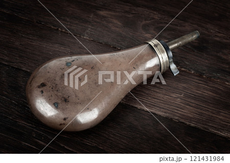Old west gunpowder flask 121431984