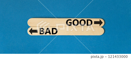 Good or bad symbol. Concept word Good or Bad on beautiful wooden stick. Beautiful blue table blue background. Business and good or bad concept. Copy space. 121433000