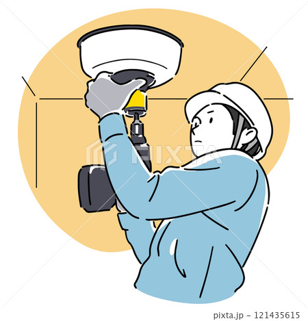 工具を使って開口する男性電気工事士 121435615