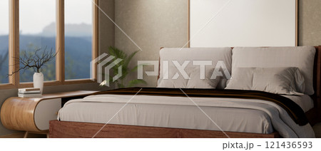 The interior design of a modern, elegant bedroom features a comfortable bed and sleek decor. The interior design of a modern, elegant bedroom features a comfortable bed and sleek decor. 121436593
