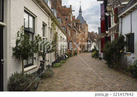 City street with a view of the facades of Amersfoort houses in Amersfoort City street with a view of the facades of Amersfoort houses in Amersfoort 121437642