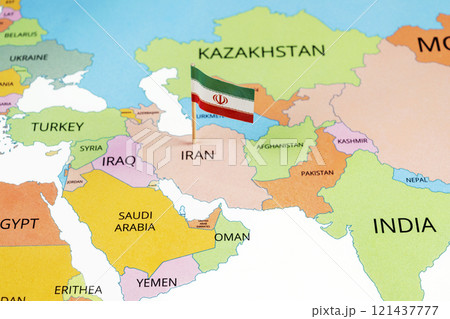 A map of Iran with the national flag of Iran on it. The flag is green, white, and red tricolor. Along the stripes' edges is the Takbir and in center is national emblem 121437777