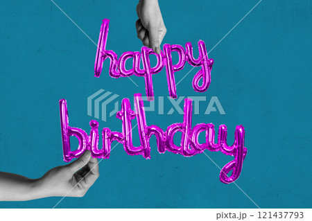 A human hand holding a balloon with the text of Happy Birthday on a colored background 121437793