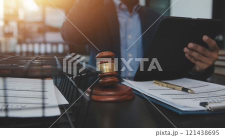 Law theme, gavel or mallet of the judge, lawyer enforcement officers, evidence-based cases taken into account in the court abount business, legislation. 121438695