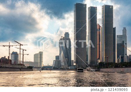 High buildings of Moscow-City, view from cruise ship and Moskva River at summer day, Russia. High buildings of Moscow-City, view from cruise ship and Moskva River at summer day, Russia. 121439093