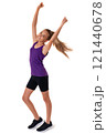 Healthy fitness cheerful girl in full length doing exercises with arms up. Isolated over white background 121440678