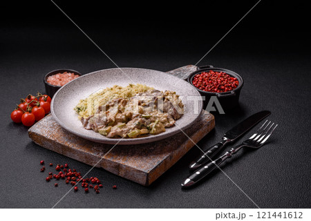 Bowl of food with beef, bulgur, tomatoes, zucchini and sauce Bowl of food with beef, bulgur, tomatoes, zucchini and sauce 121441612