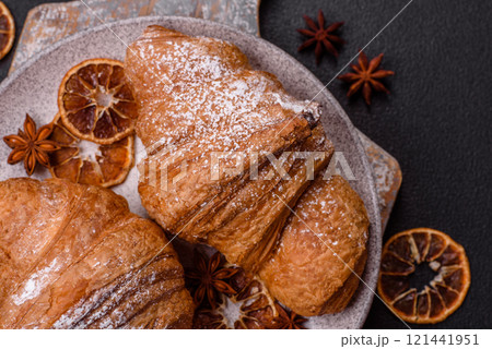 Delicious crispy sweet croissant with chocolate 121441951