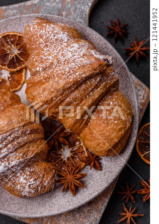 Delicious crispy sweet croissant with chocolate 121441952