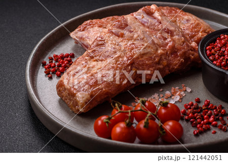 Pork ribs in sweet and sour sauce with salt and spices Pork ribs in sweet and sour sauce with salt and spices 121442051