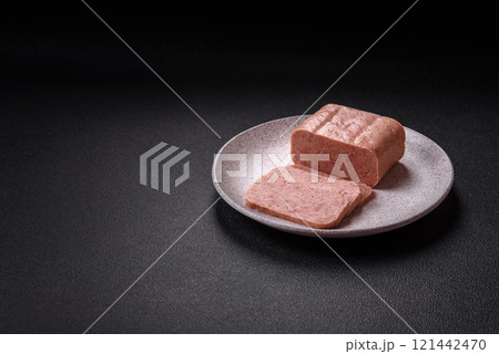 Delicious canned pink spiced ham or spam with salt, spices and herbs Delicious canned pink spiced ham or spam with salt, spices and herbs 121442470