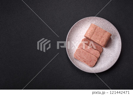 Delicious canned pink spiced ham or spam with salt, spices and herbs Delicious canned pink spiced ham or spam with salt, spices and herbs 121442471