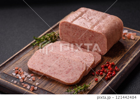 Delicious canned pink spiced ham or spam with salt, spices and herbs Delicious canned pink spiced ham or spam with salt, spices and herbs 121442484