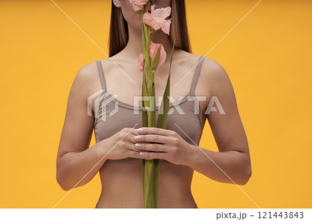 Beautiful Woman Posing With Flower Beautiful Woman Posing With Flower 121443843