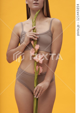 Slim Woman With Beautiful Flower Slim Woman With Beautiful Flower 121443854