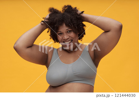 Happy Self-confident Woman Posing At Camera Happy Self-confident Woman Posing At Camera 121444030