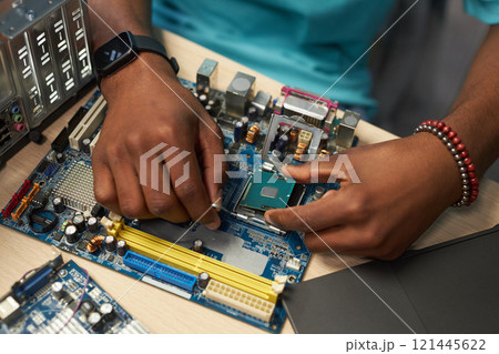 Repairman Working With Computer Details Repairman Working With Computer Details 121445622